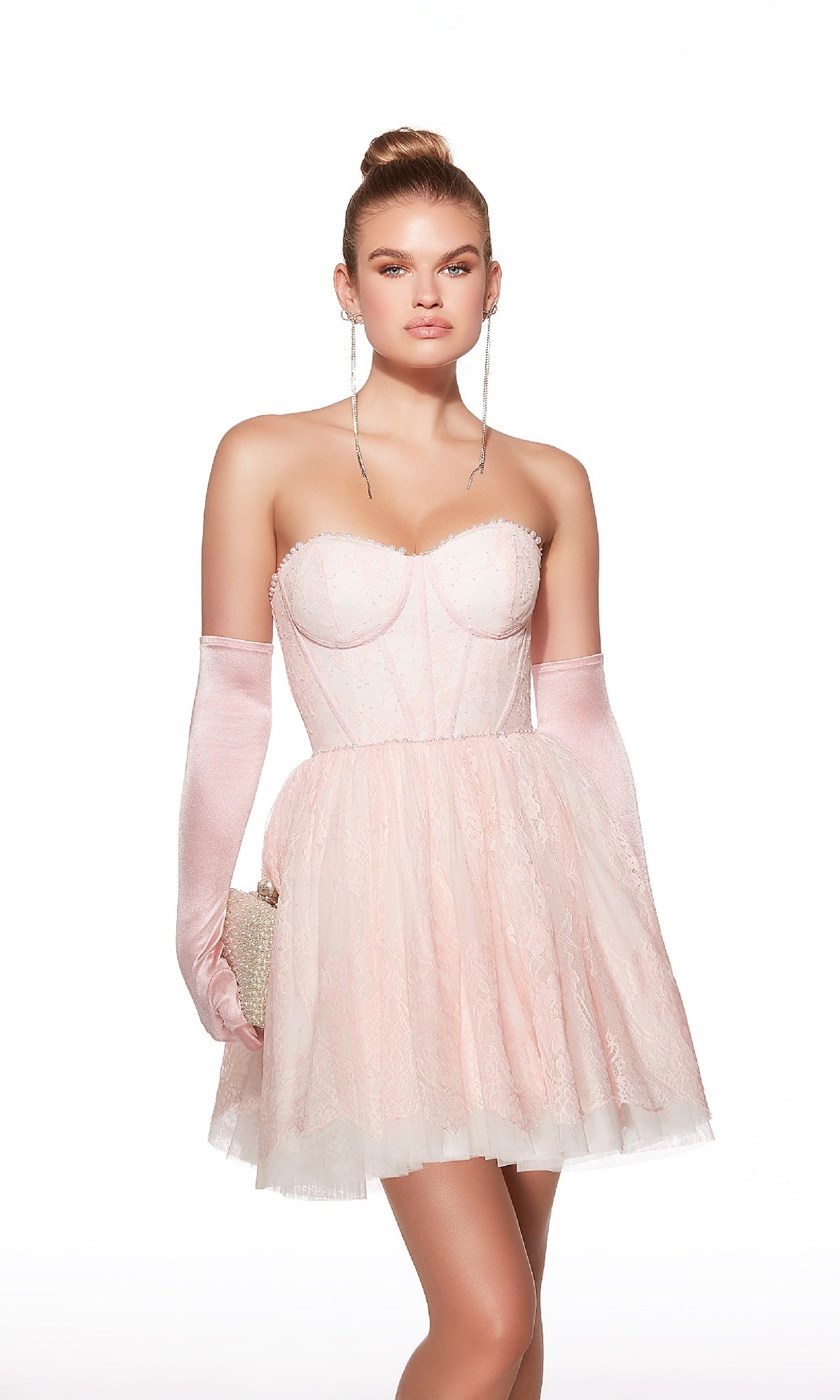 Woman wearing the Alyce 30041 Strapless Short Lace Hoco Dress, paired with long satin gloves, a small clutch, and a high bun hairstyle against a white background.